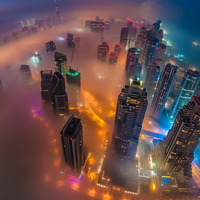 Dubai above the clouds by Jason Kabuki