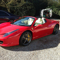 The Only Red Ferrari In The Parking Lot by Phil Green